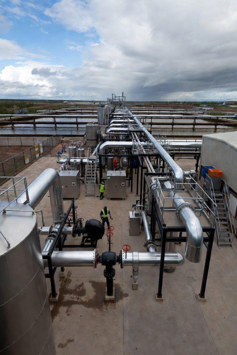 Centrifuge and tailings dewatering equipment at an oil sands facility